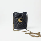 Gucci GG Marmont Small Bucket Bag Nera in Pelle Matelassé
