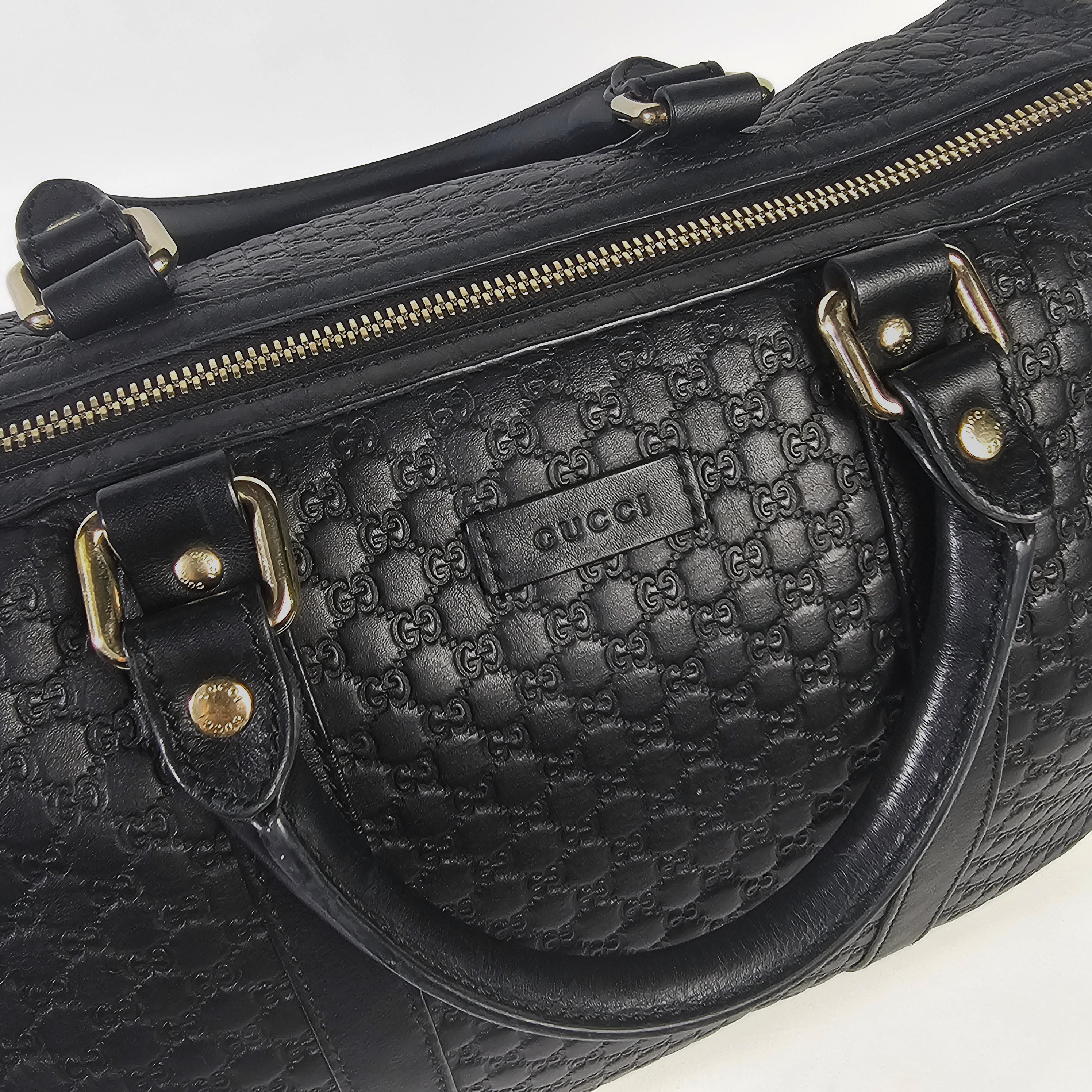 Gucci Boston Microguccissima in pelle nera