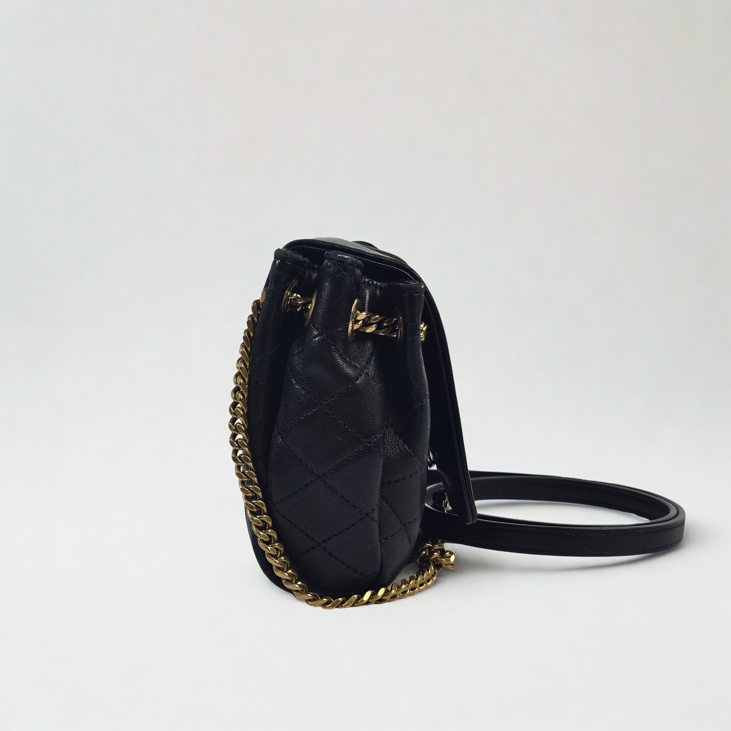 Saint Laurent Mini Nolita in pelle nera trapuntata con finiture oro
