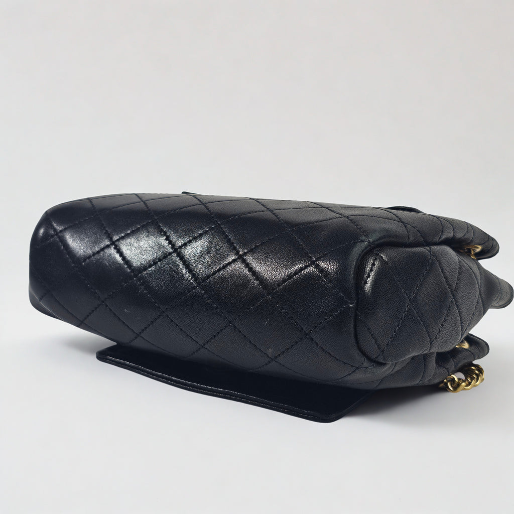 Saint Laurent Mini Nolita in pelle nera trapuntata con finiture oro