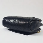 Saint Laurent Mini Nolita in pelle nera trapuntata con finiture oro