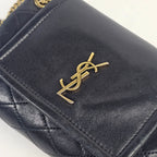 Saint Laurent Mini Nolita in pelle nera trapuntata con finiture oro