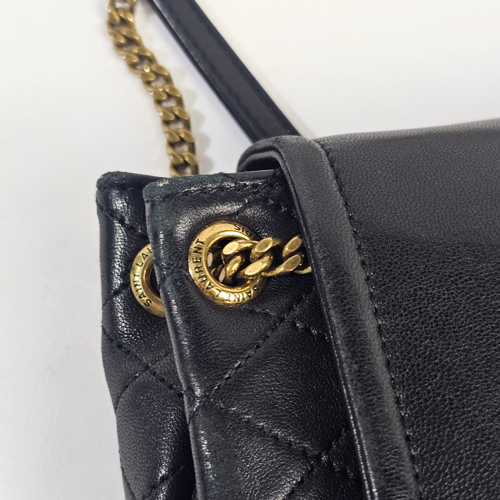 Saint Laurent Mini Nolita in pelle nera trapuntata con finiture oro