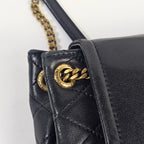 Saint Laurent Mini Nolita in pelle nera trapuntata con finiture oro